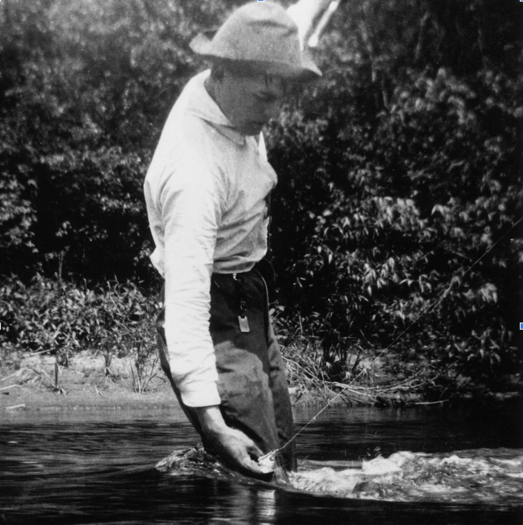 Hemingway netting a trout