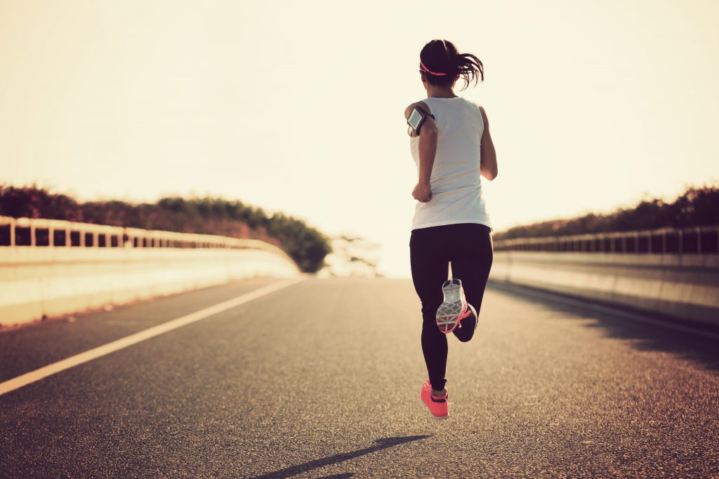 get faster run times in a half-marathon with music