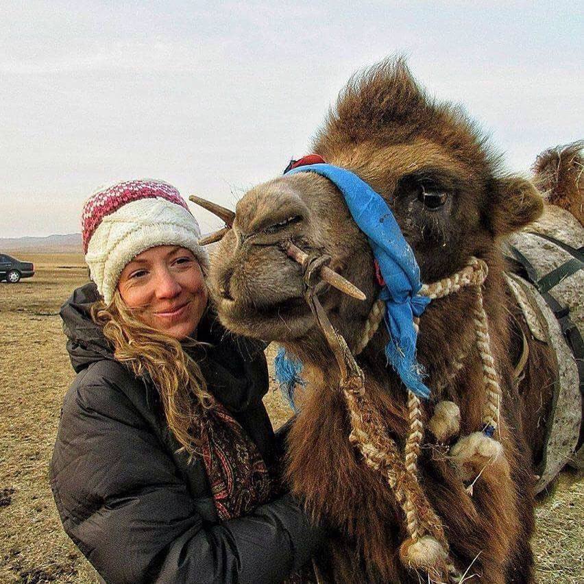 Angela Maxwell with a camel walked around world